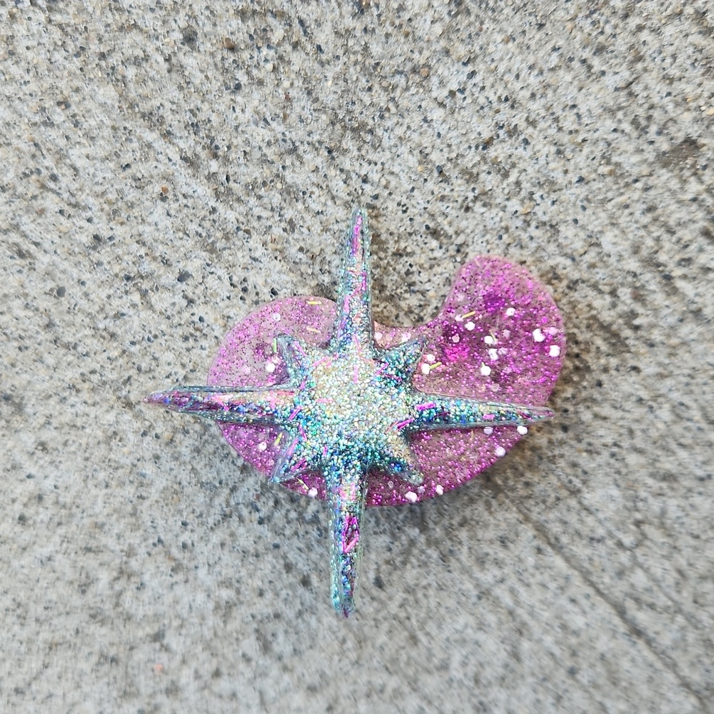 atomic resin brooch